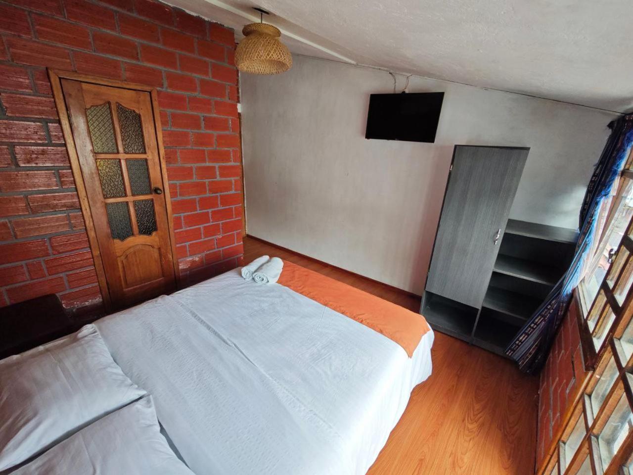 Garden House Hostal Baños Εξωτερικό φωτογραφία
